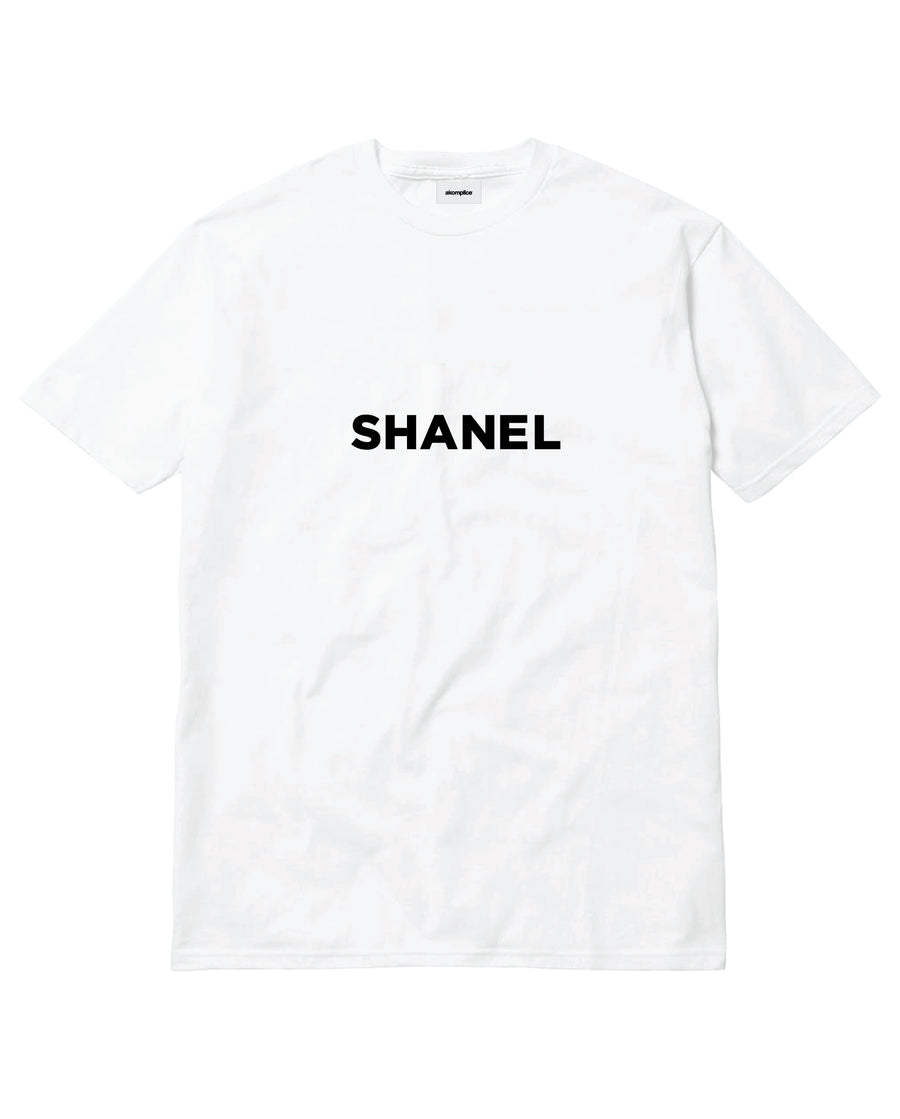 White t-shirt with 'SHANEL' printed on it against a white background