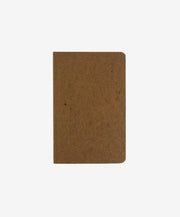Brown notebook on a white background