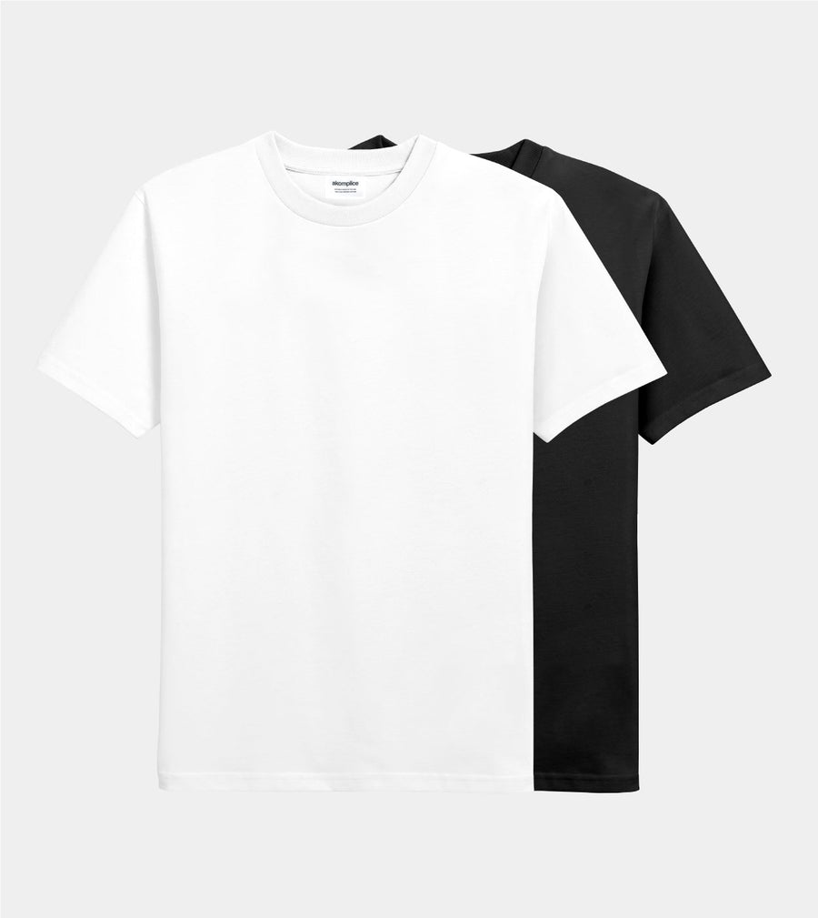 White t-shirt with black sleeves on a light gray background