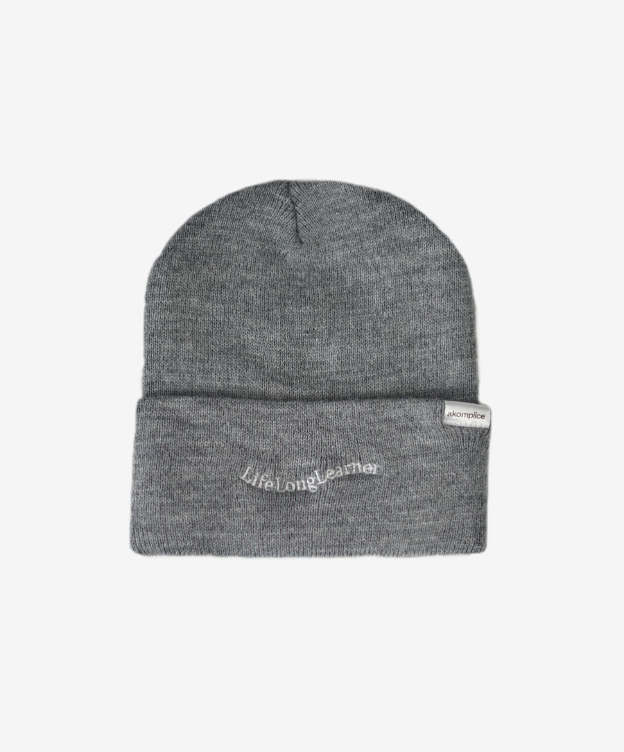 Gray beanie with 'Lifelong Learner' text on a white background