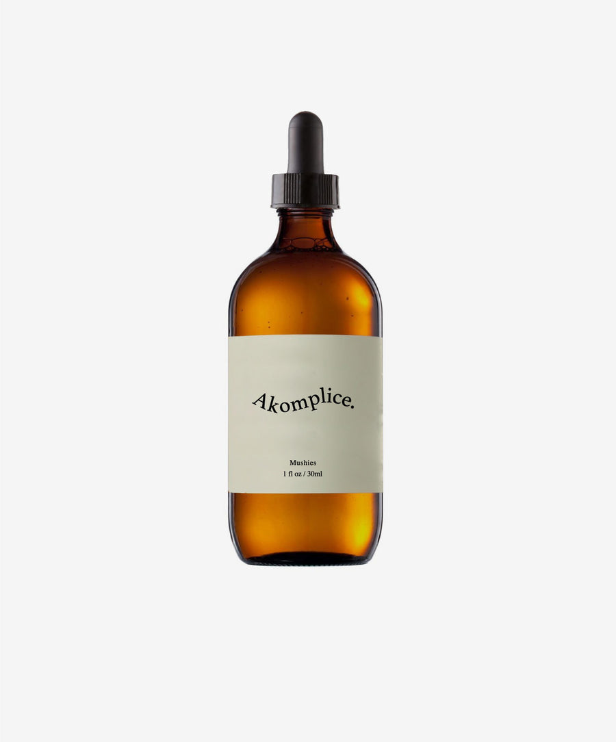 Brown glass bottle with a label on a white background