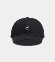 Black cap with a pink flamingo logo on a light gray background