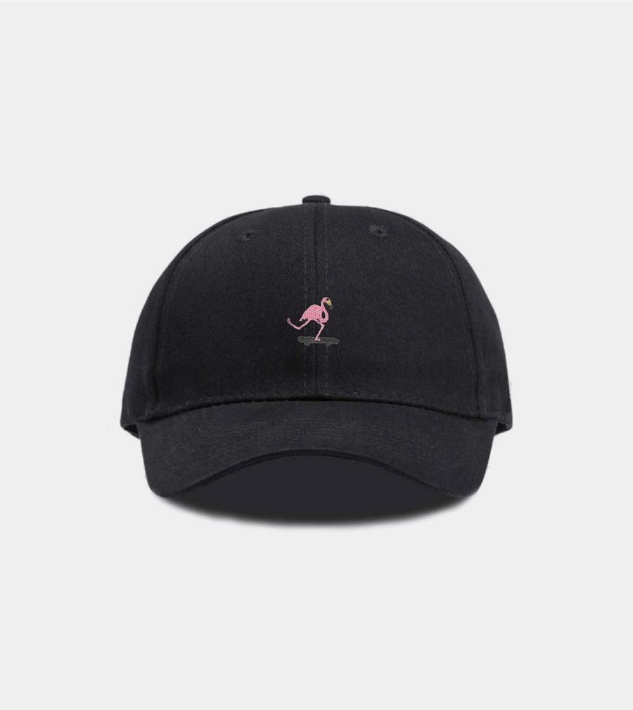 Black cap with a pink flamingo logo on a light gray background