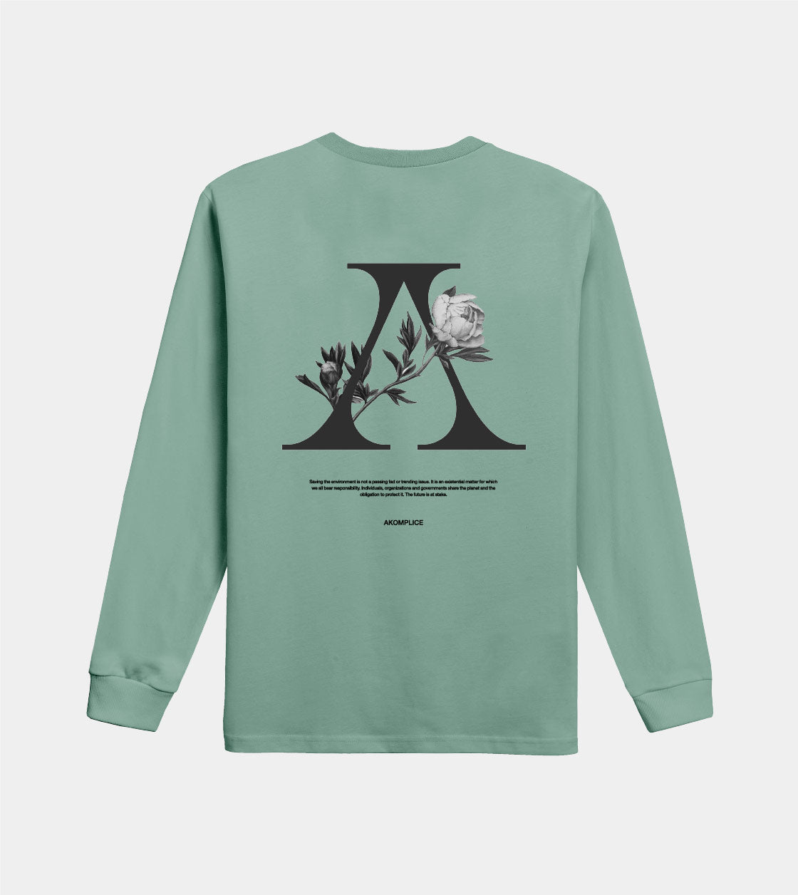 Green long-sleeve shirt with black graphic design on a white background