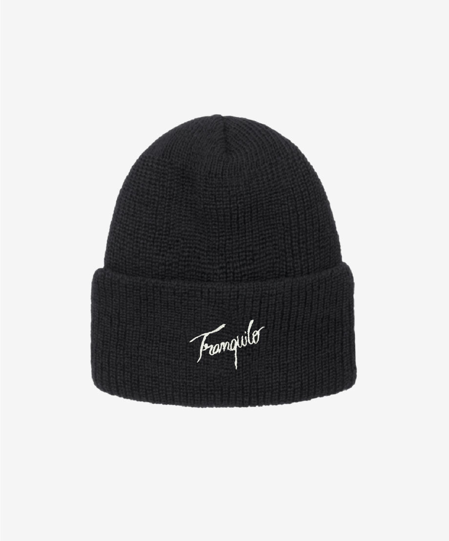 Black beanie with 'Franquilo' embroidery on a light gray background