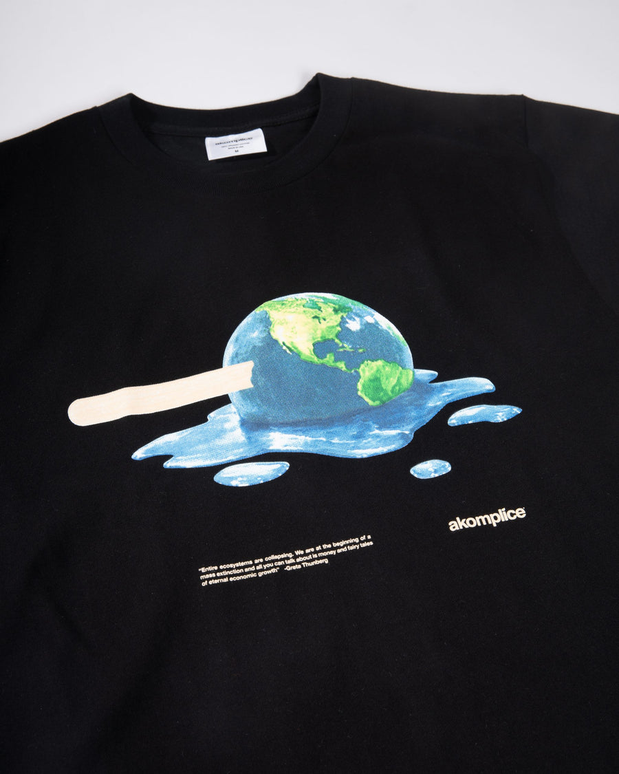 Black sweatshirt with a graphic of a melting Earth on a popsicle, featuring the brand 'akomplice'.