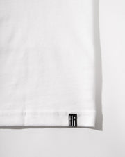 White fabric with a black label on a white background