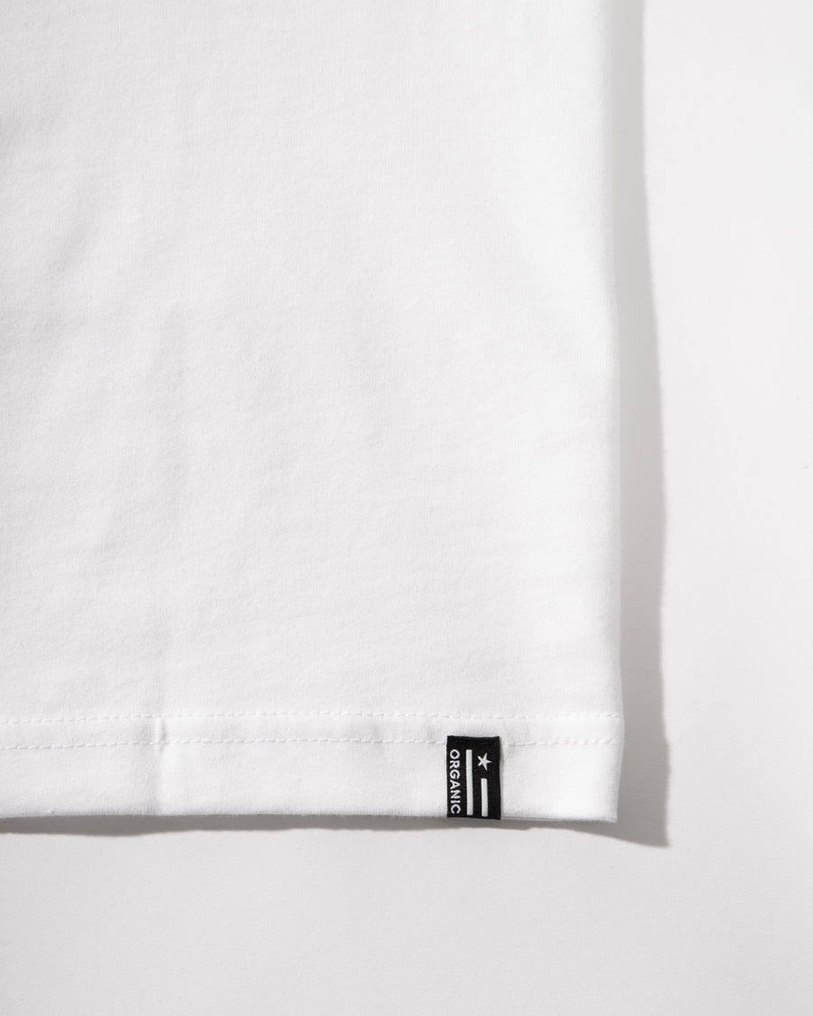 White fabric with a black label on a white background
