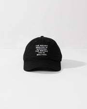 Black cap with white text on a white background