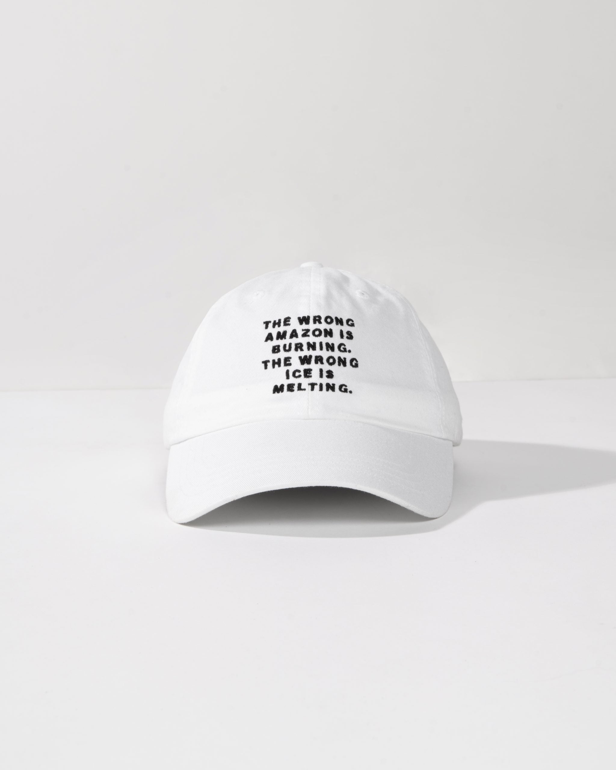 White cap with black text on a white background
