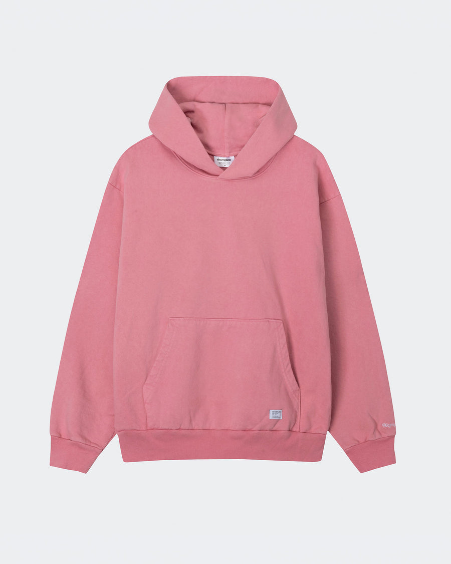 Pink hoodie on a light gray background