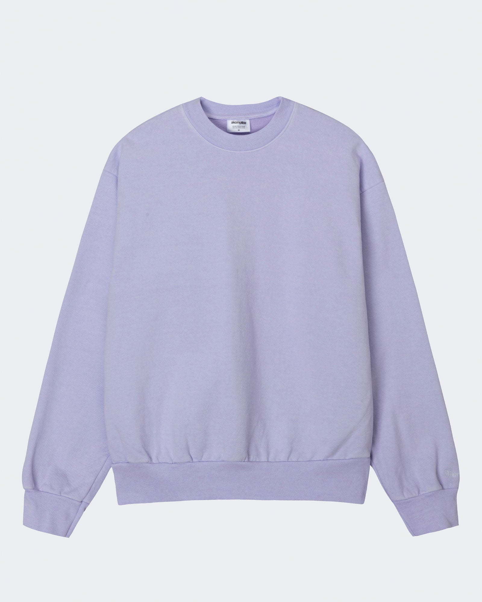 Lavender sweatshirt on a light gray background