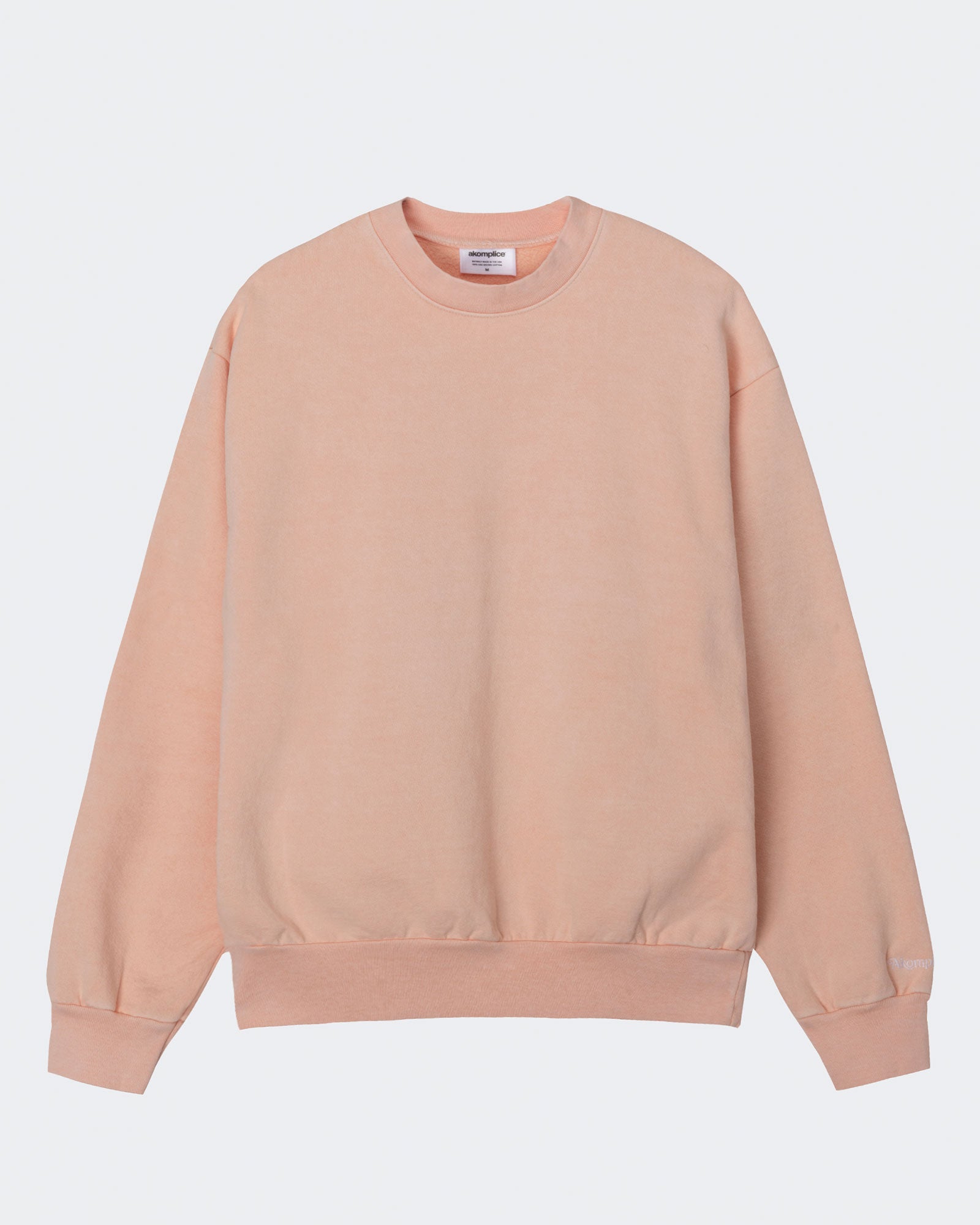 Beige sweatshirt on a light gray background