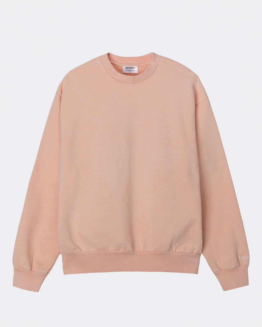 Beige sweatshirt on a light gray background