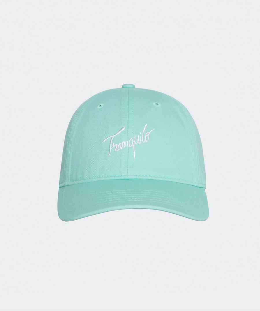 Mint green cap with white text on a light gray background
