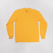 Yellow long-sleeve shirt on a light gray background
