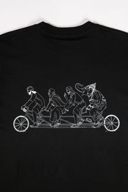Black t-shirt with white graphic of four people on a tandem bicycle.