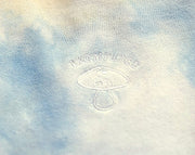 Textured fabric surface with 'Kromski' branding and logo.