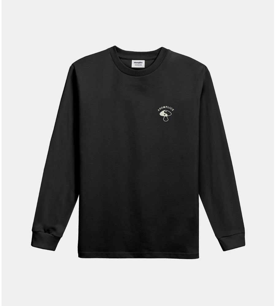Black long-sleeve shirt with a small logo on a light gray background