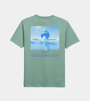 Green t-shirt with a graphic of a ship in the ocean on a white background