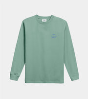 Green long-sleeve shirt with small text on a light gray background