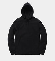 Black hoodie on a light gray background