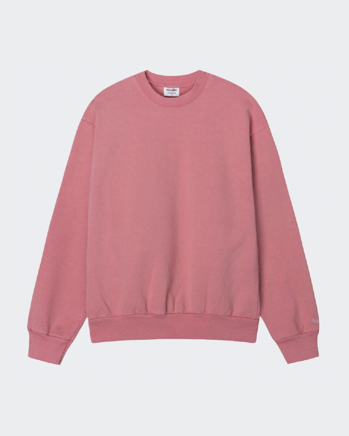 Pink sweatshirt on a light gray background
