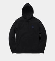 Black hoodie with a small logo on a light gray background