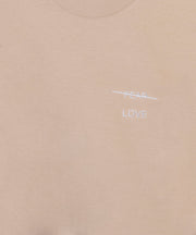 Beige fabric with 'FEAR' and 'LOVE' text on a white background