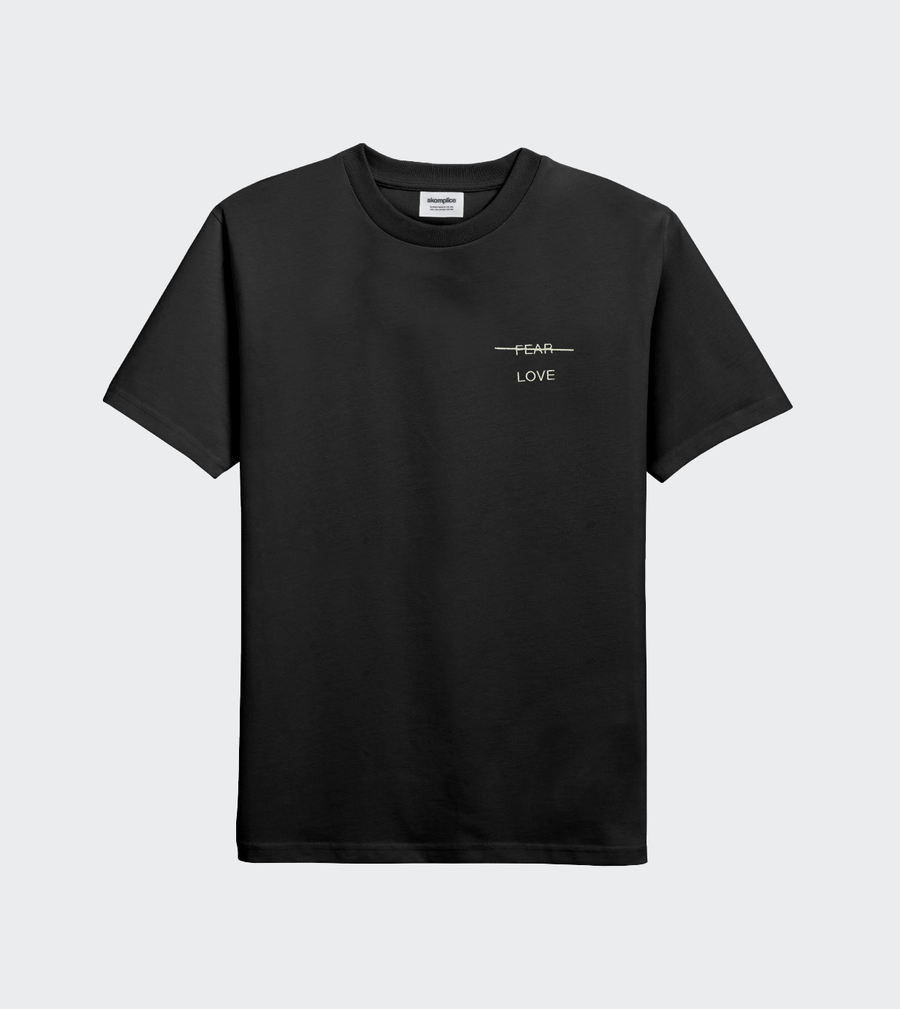 Black t-shirt with text design on a light gray background