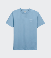 Light blue t-shirt with a small white logo on a light gray background