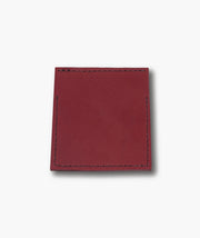 Red leather wallet on a white background
