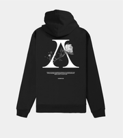 Black hoodie with white floral and letter design on the back against a light gray background
