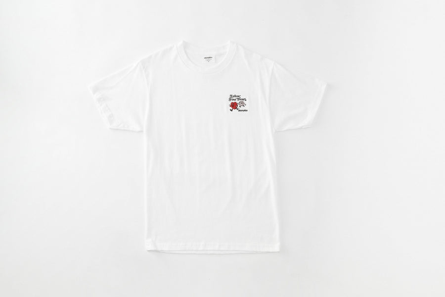 White sleeveless shirt with a small logo on a white background