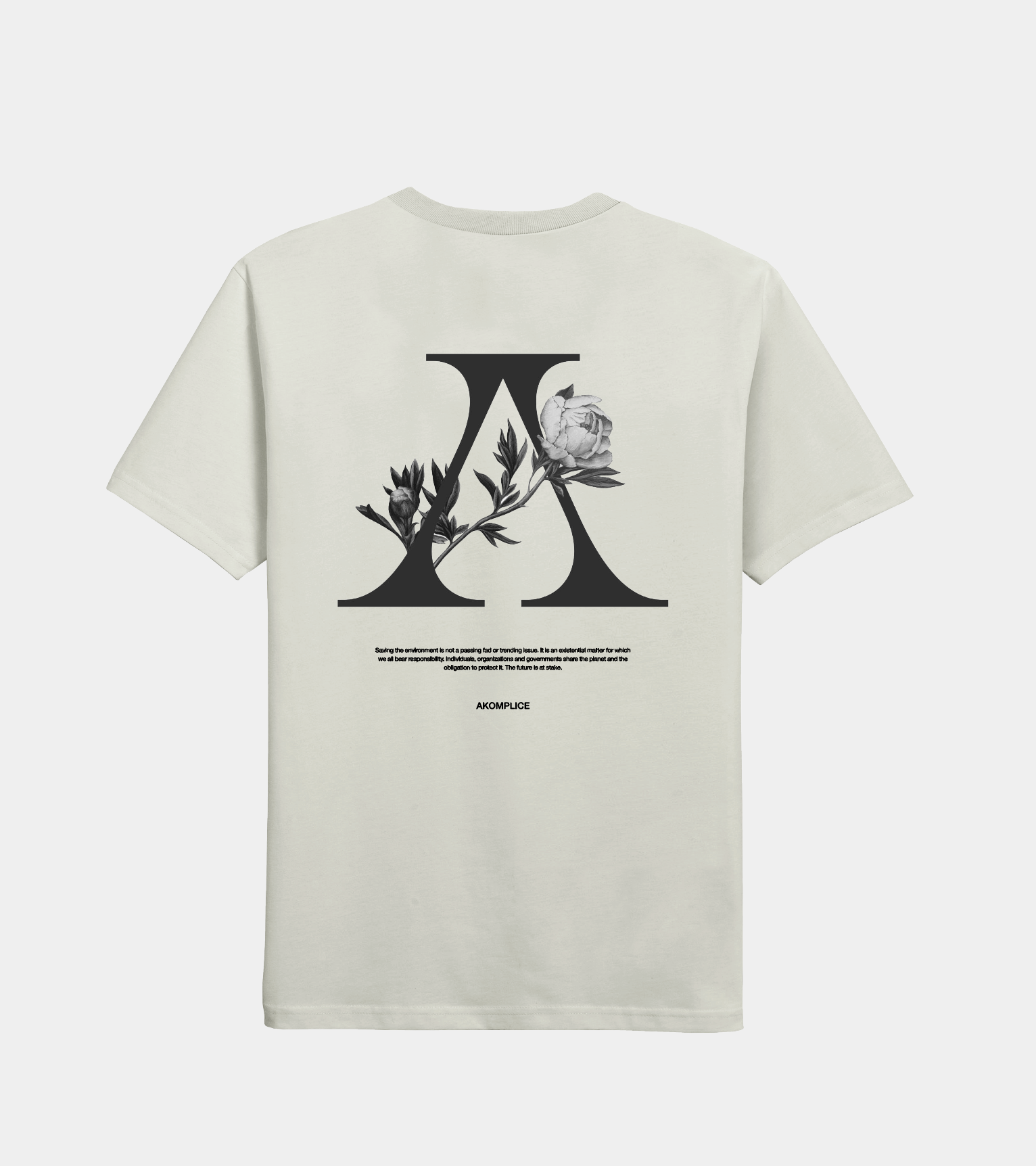 Beige t-shirt with black floral design and letter 'A' on a white background
