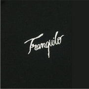 White embroidered text on a black background