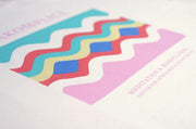 Colorful zigzag pattern on a white background with text overlay.
