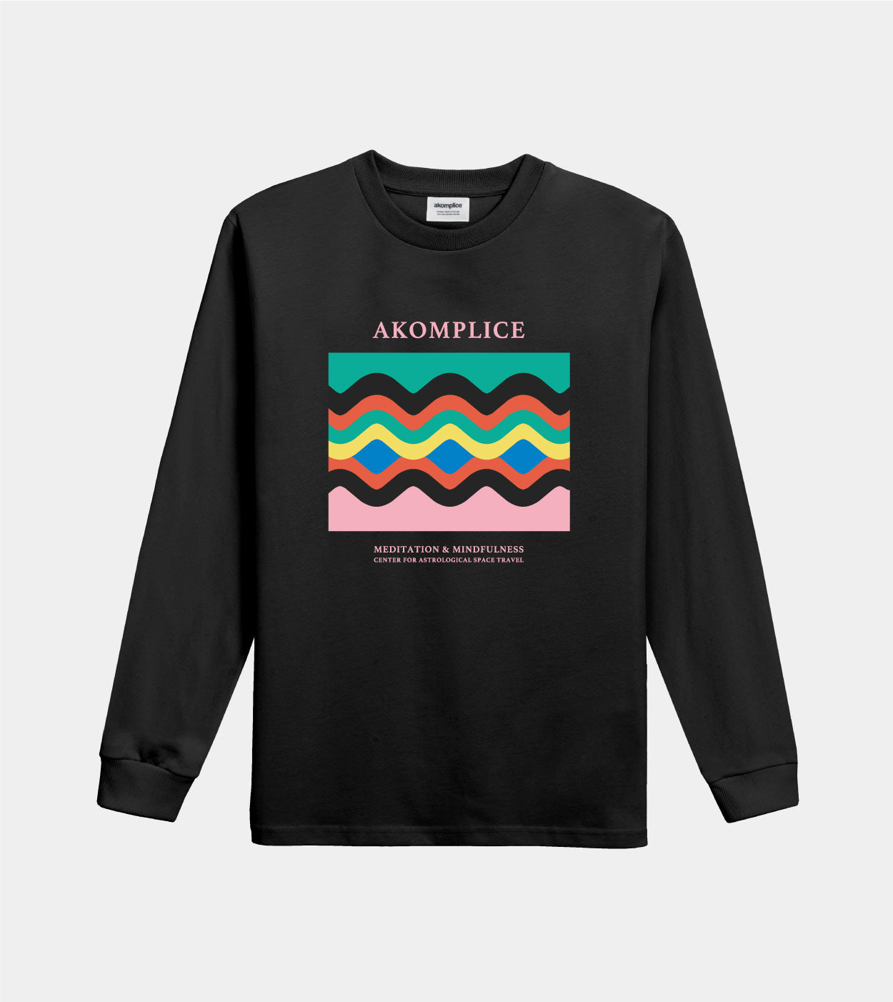 Black long-sleeve shirt with colorful graphic and 'Akomplice' branding on a light gray background
