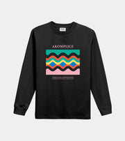 Black long-sleeve shirt with colorful graphic and 'Akomplice' branding on a light gray background