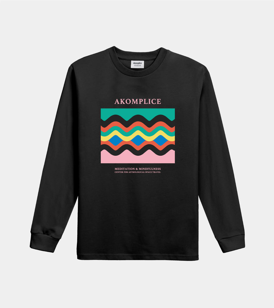 Black long-sleeve shirt with colorful graphic and 'Akomplice' branding on a light gray background