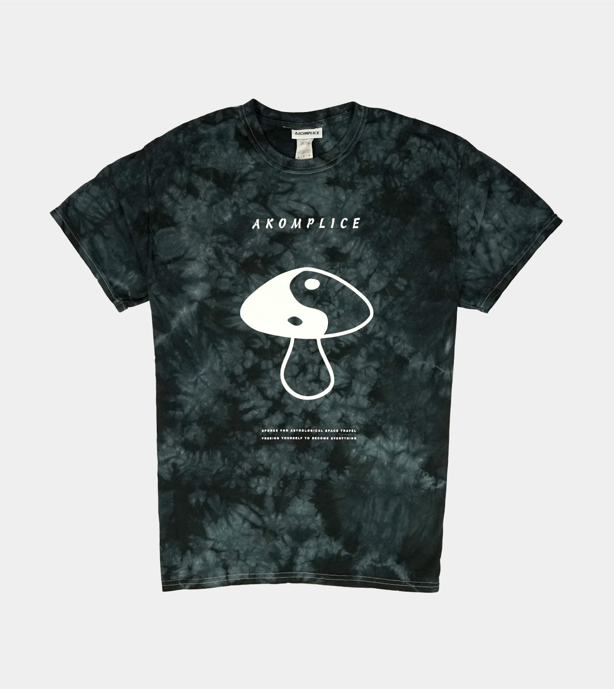 Tie-dye t-shirt with a mushroom graphic and 'Aromplice' branding on a light gray background