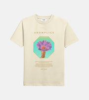 Beige t-shirt with a colorful flower graphic and 'AKOMPLICE' text on a white background