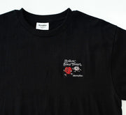 Black t-shirt with 'Fellow Your Heart' design and 'akomplice' branding.