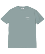 Light blue t-shirt with a small white logo and text on a white background