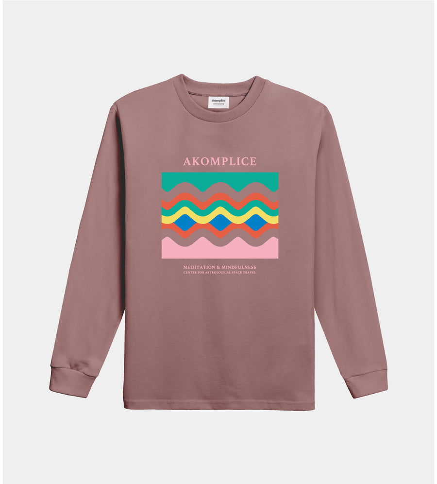 Brown long-sleeve shirt with colorful graphic and 'AKOMPLICE' branding on a white background