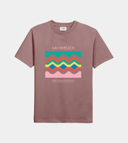 Brown t-shirt with colorful graphic and 'AKOMPLICE' branding on a light gray background