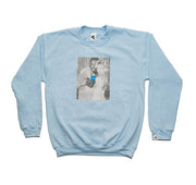Light blue sweatshirt with a graphic design on a white background