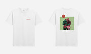 White t-shirt with a graphic design of two people holding hands on a green background.