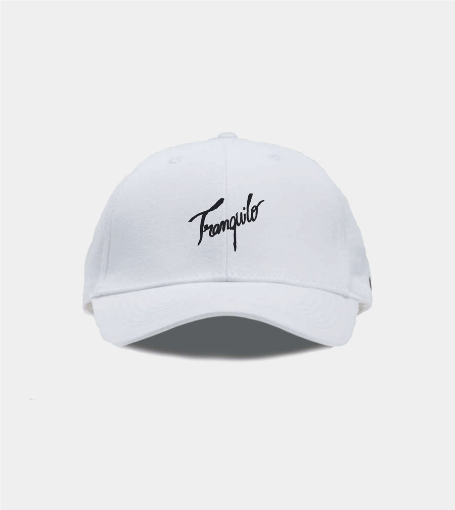 White cap with black text on a light gray background