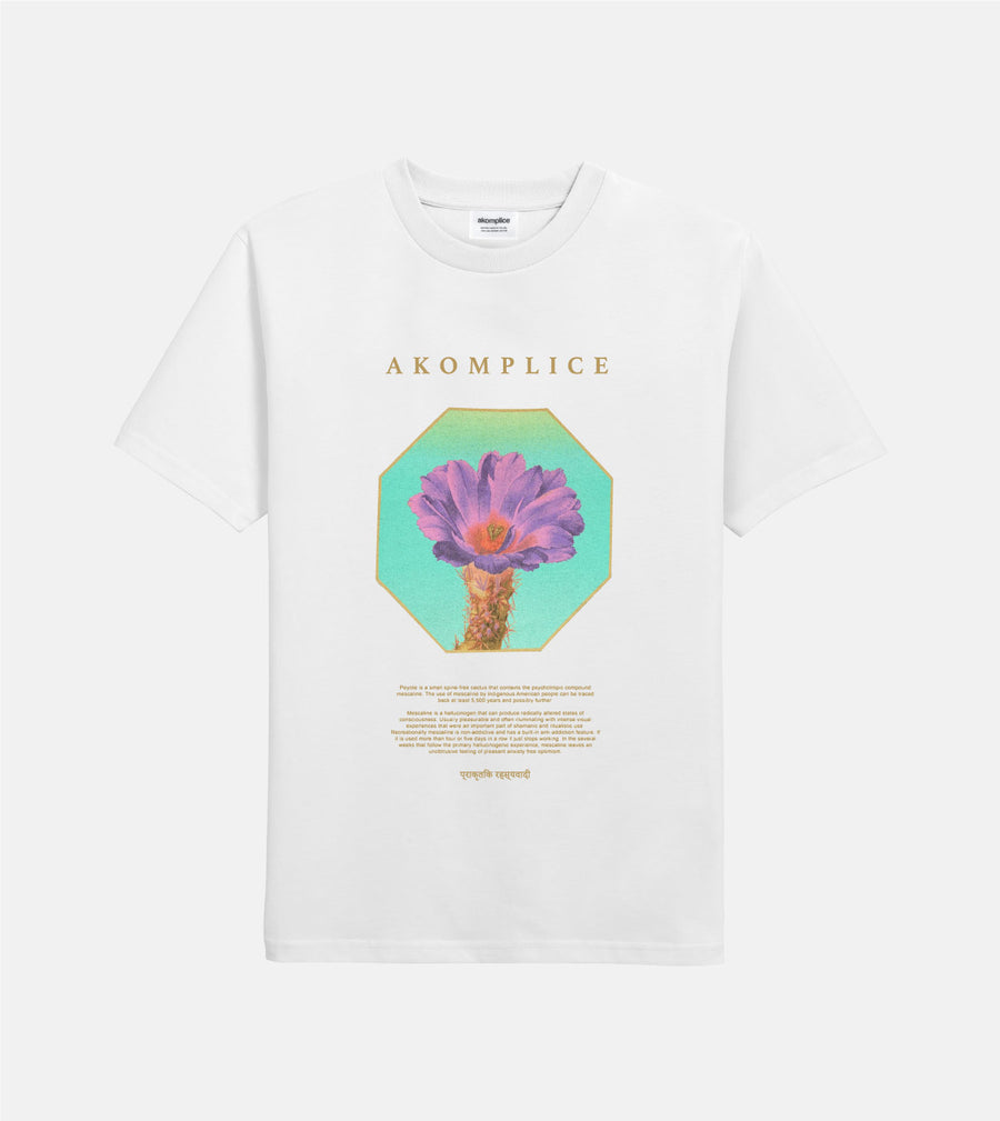 White t-shirt with a colorful cactus graphic and 'Akomplice' branding on a white background